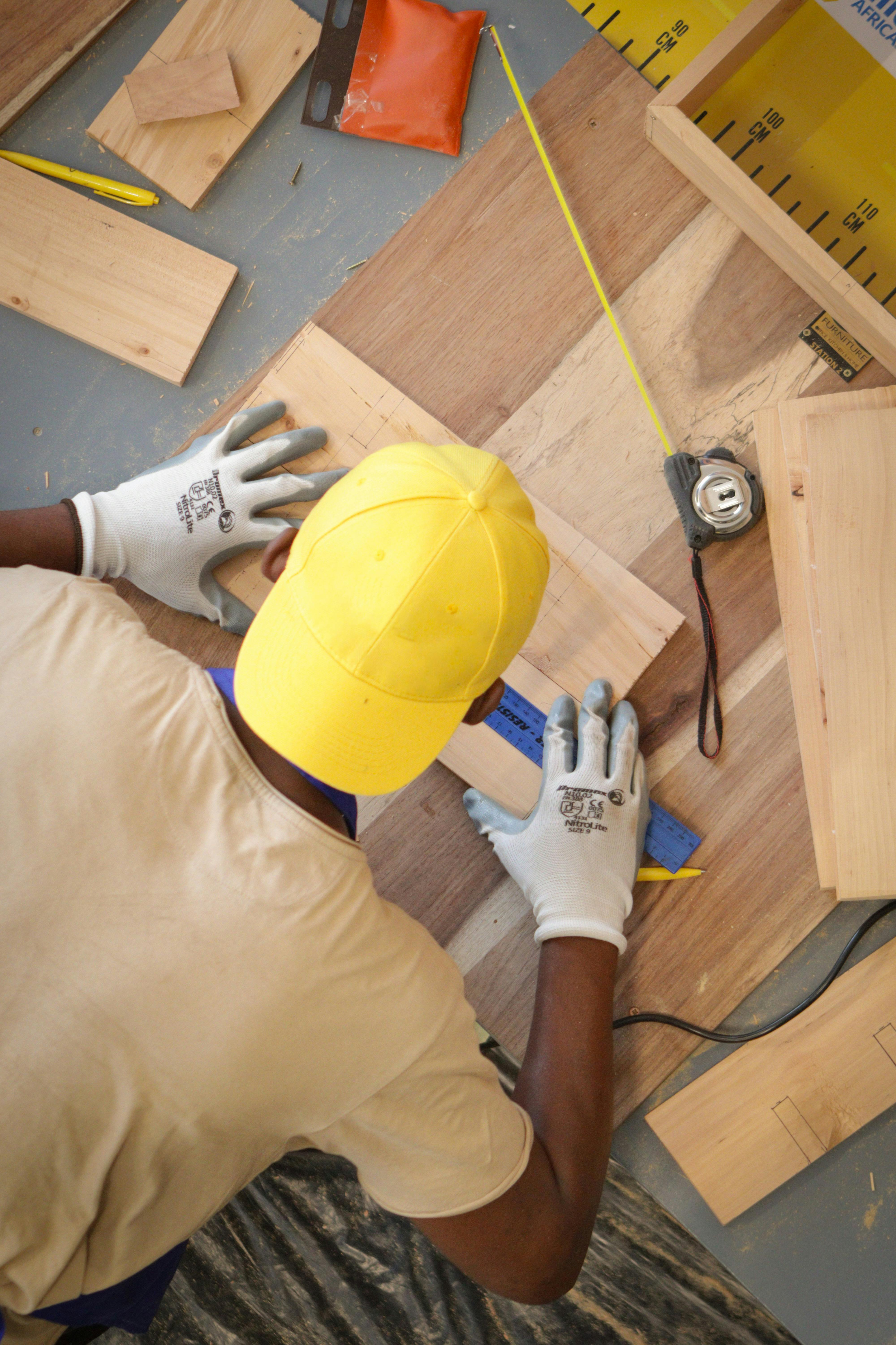 Worker doing drywall